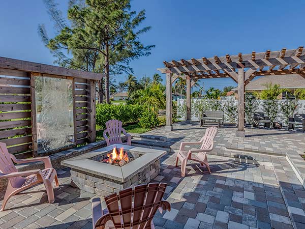 Pergola and fire pit in backyard
